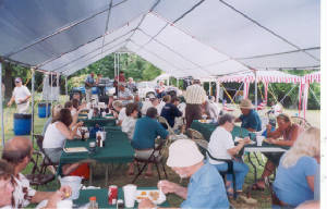 eatingundertent.jpg